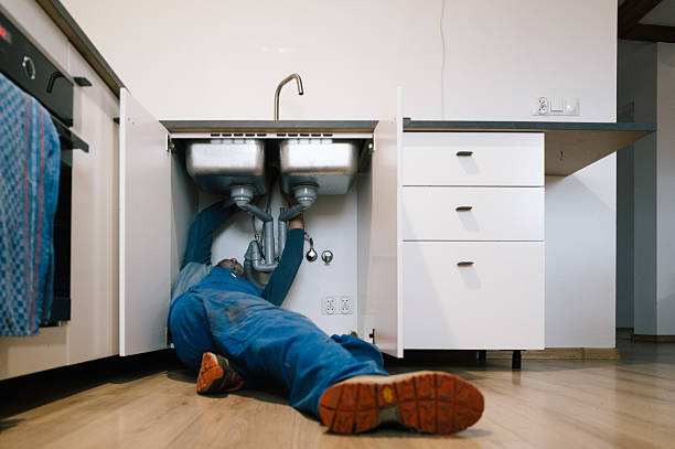 Professional Emergency Plumber technician working in Madison, NJ